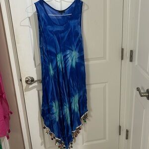 Beautiful Long size small but fits larger, blue cover-up with pom-pom detail